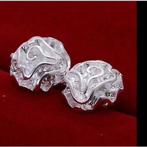 Woman flower like silver earrings